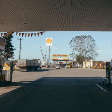 Empty gas station with oil petrol dispensers located on highway for serving long distance vehicles