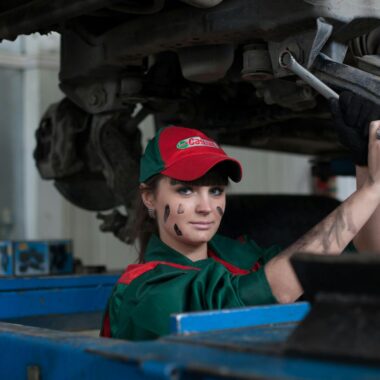 Woman Holding Gray Steel Wrench